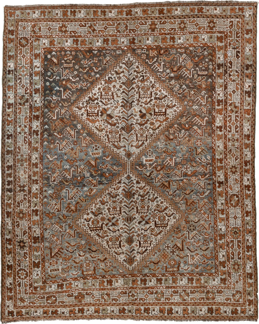 4' x 6' one-of-a-kind handmade antique Shiraz rug. Color palette: blue gray, ivory, rust, charcoal, taupe, terracotta, brown