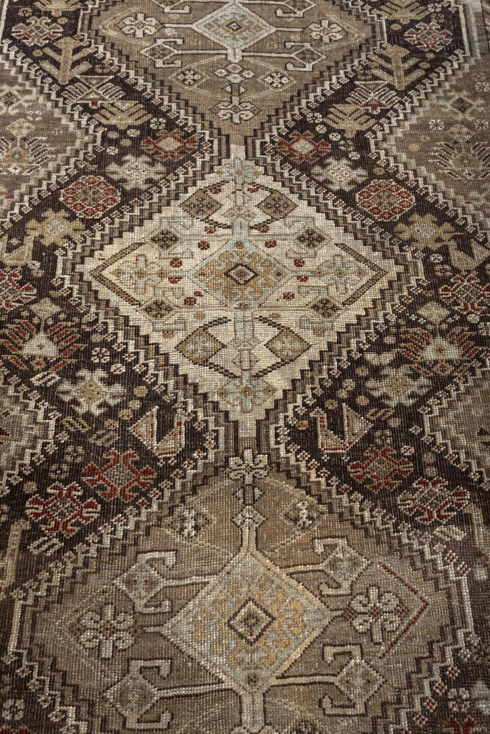 3' x 5' one-of-a-kind handmade antique Shiraz small size rug. Color palette: taupe, charcoal, ivory, camel, brown, rust
