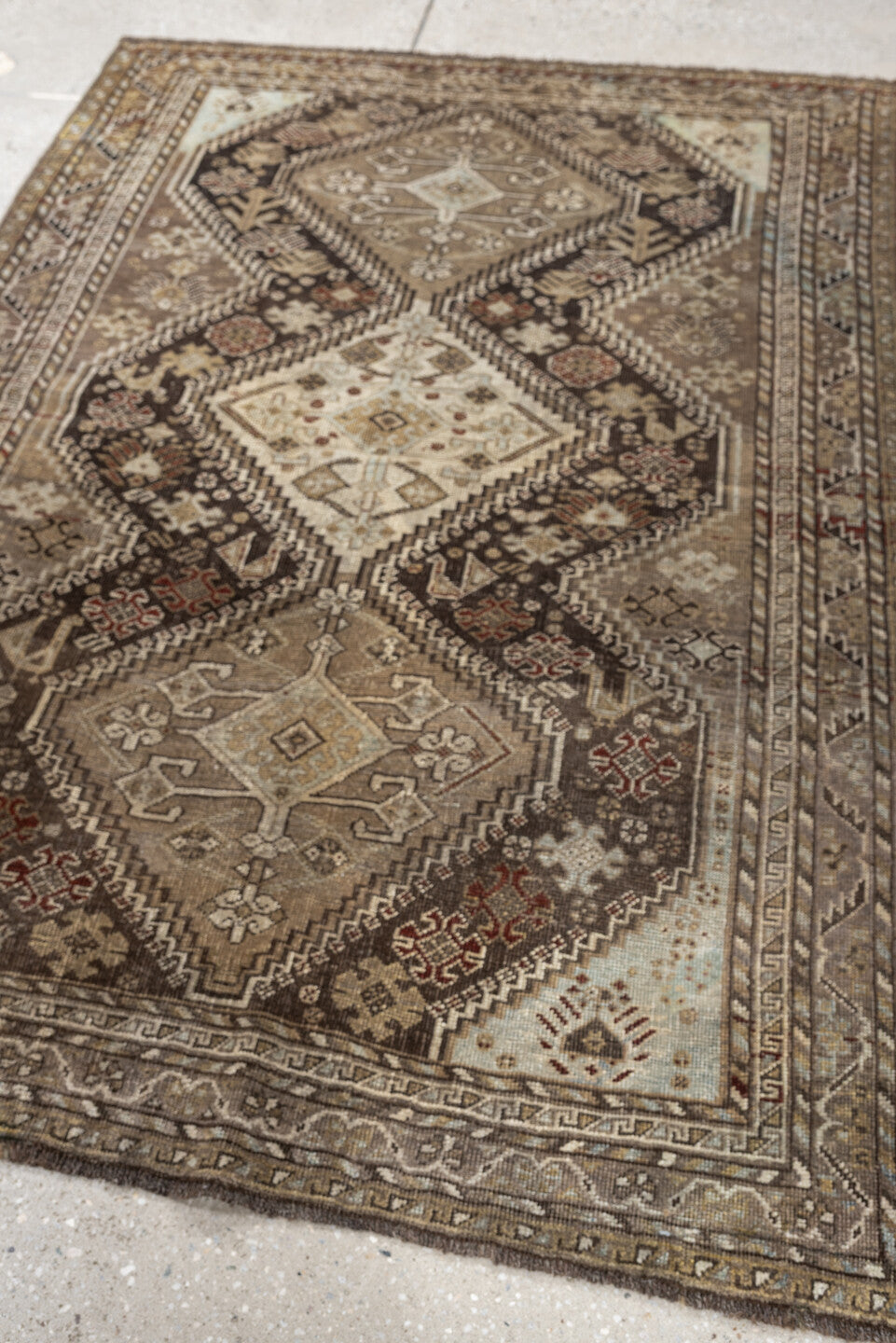 3' x 5' one-of-a-kind handmade antique Shiraz small size rug. Color palette: taupe, charcoal, ivory, camel, brown, rust