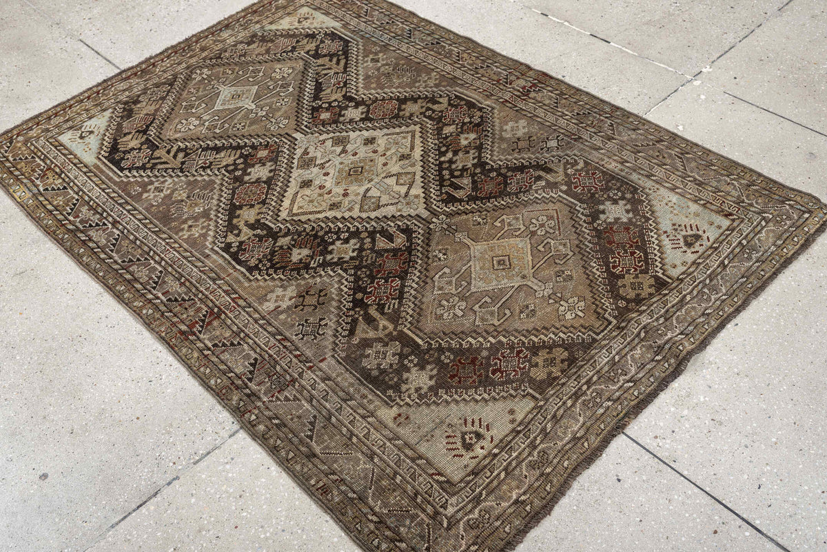 3' x 5' one-of-a-kind handmade antique Shiraz small size rug. Color palette: taupe, charcoal, ivory, camel, brown, rust