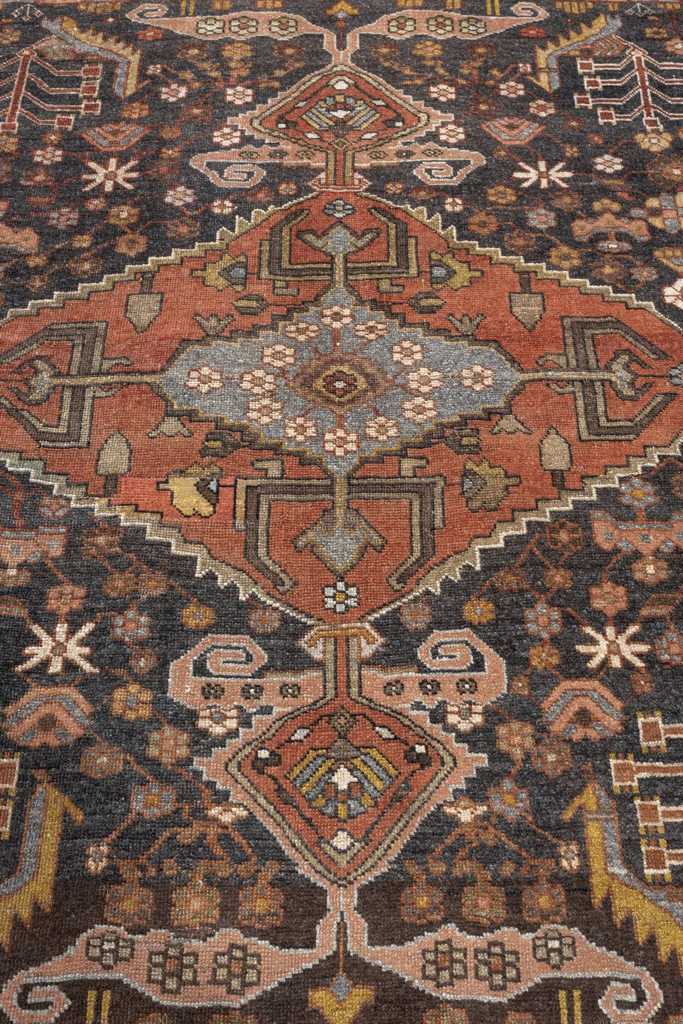 4' x 5' one-of-a-kind handmade antique Bakhshayesh rug. Color palette: charcoal, terracotta, ivory, rust, sage, gold