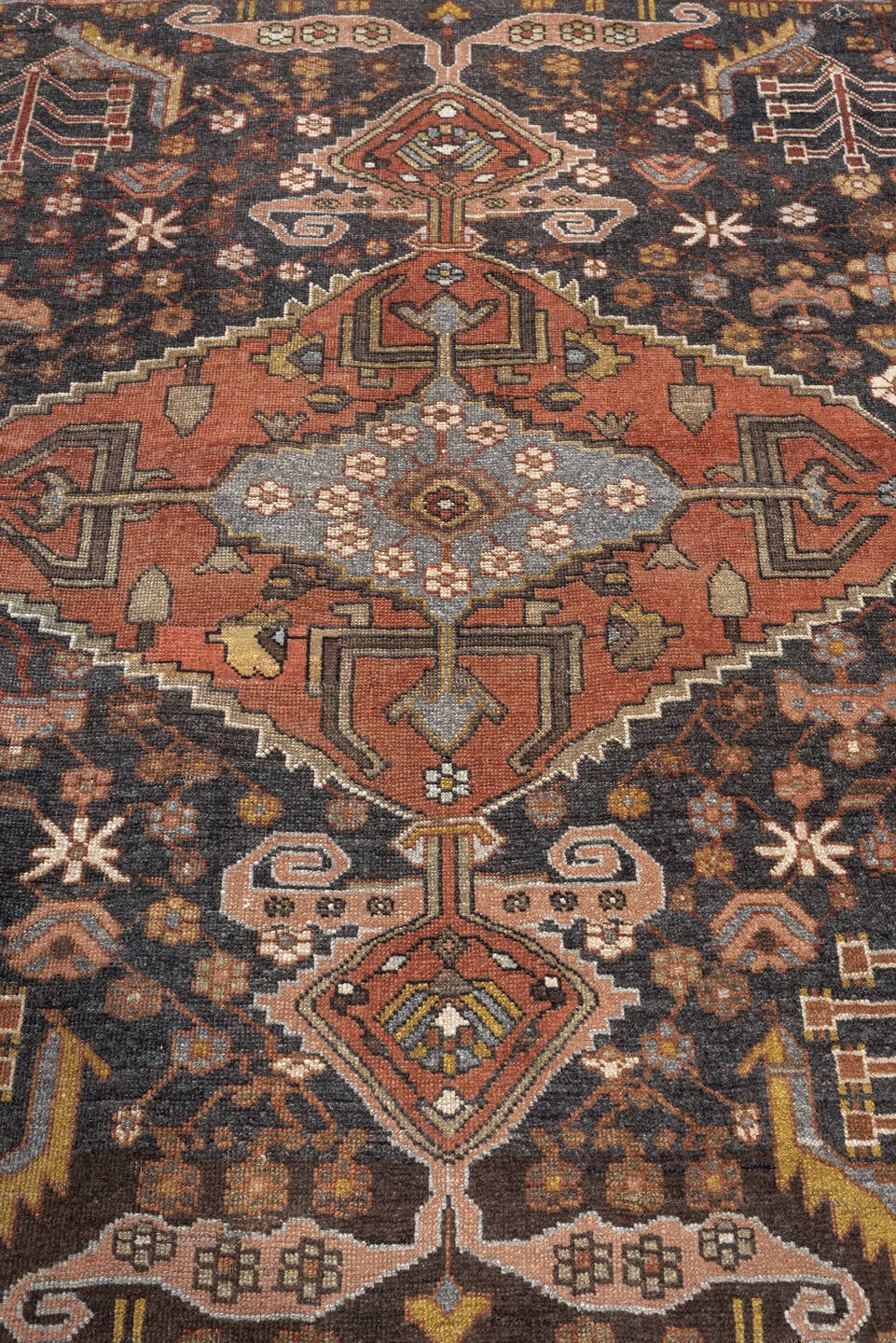 4' x 5' one-of-a-kind handmade antique Bakhshayesh rug. Color palette: charcoal, terracotta, ivory, rust, sage, gold