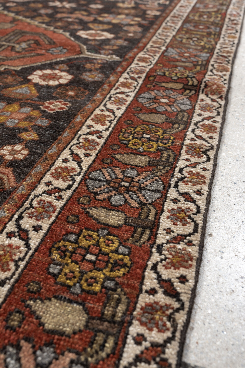 4' x 5' one-of-a-kind handmade antique Bakhshayesh rug. Color palette: charcoal, terracotta, ivory, rust, sage, gold