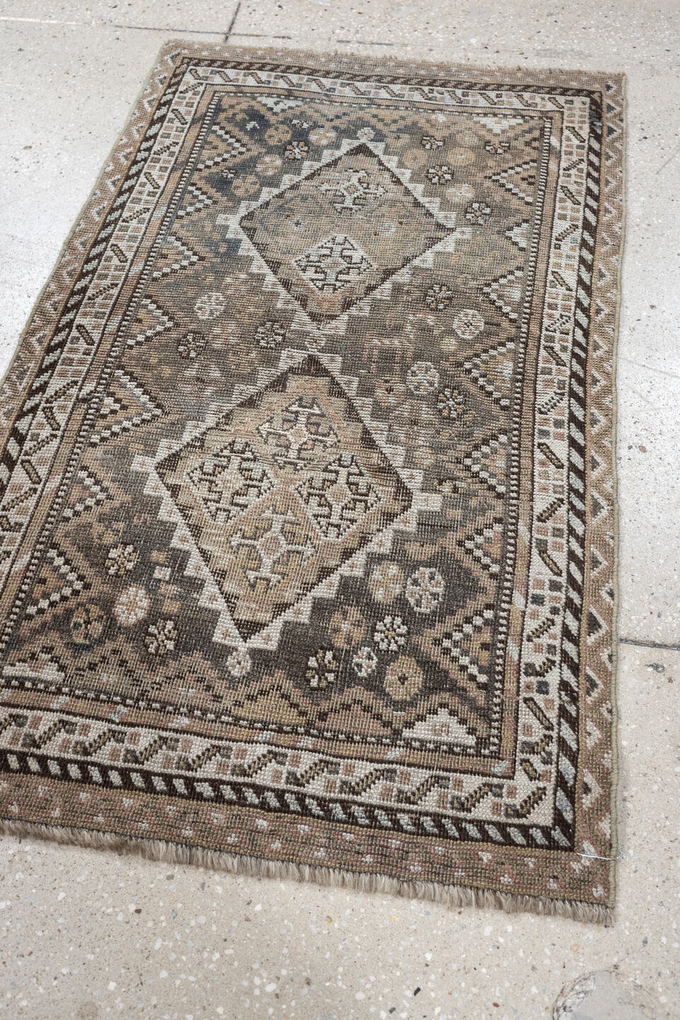 2' x 3' one-of-a-kind handmade antique Shiraz small size rug. Color palette: taupe, ivory, charcoal, brown, camel, slate