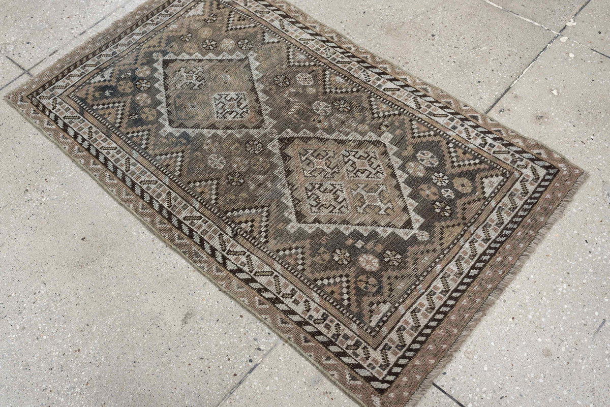 2' x 3' one-of-a-kind handmade antique Shiraz small size rug. Color palette: taupe, ivory, charcoal, brown, camel, slate