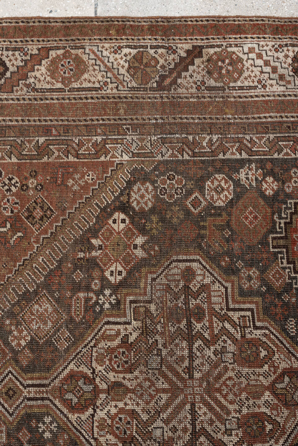 4' x 6' one-of-a-kind handmade antique Shiraz rug. Color palette: brown, rust, ivory, terracotta, charcoal, camel, sage