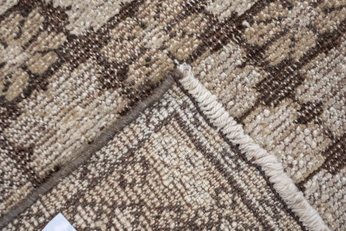 5' x 7' one-of-a-kind handmade antique Kurd rug. Color palette: taupe, ivory, charcoal, camel, beige, brown, gray, black