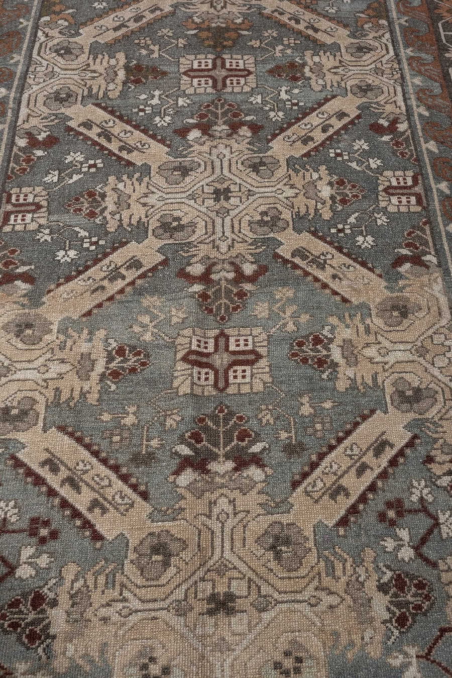 5' x 9' one-of-a-kind handmade antique Zeichur medium size rug. Color palette: blue gray, ivory, taupe, rust
