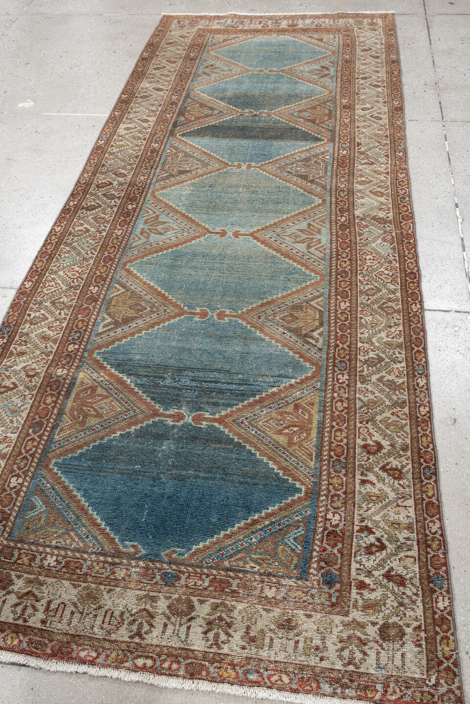 3' x 9' one-of-a-kind handmade antique Kurd runner rug. Color palette: teal, ivory, rust, slate, terracotta, taupe, charcoal