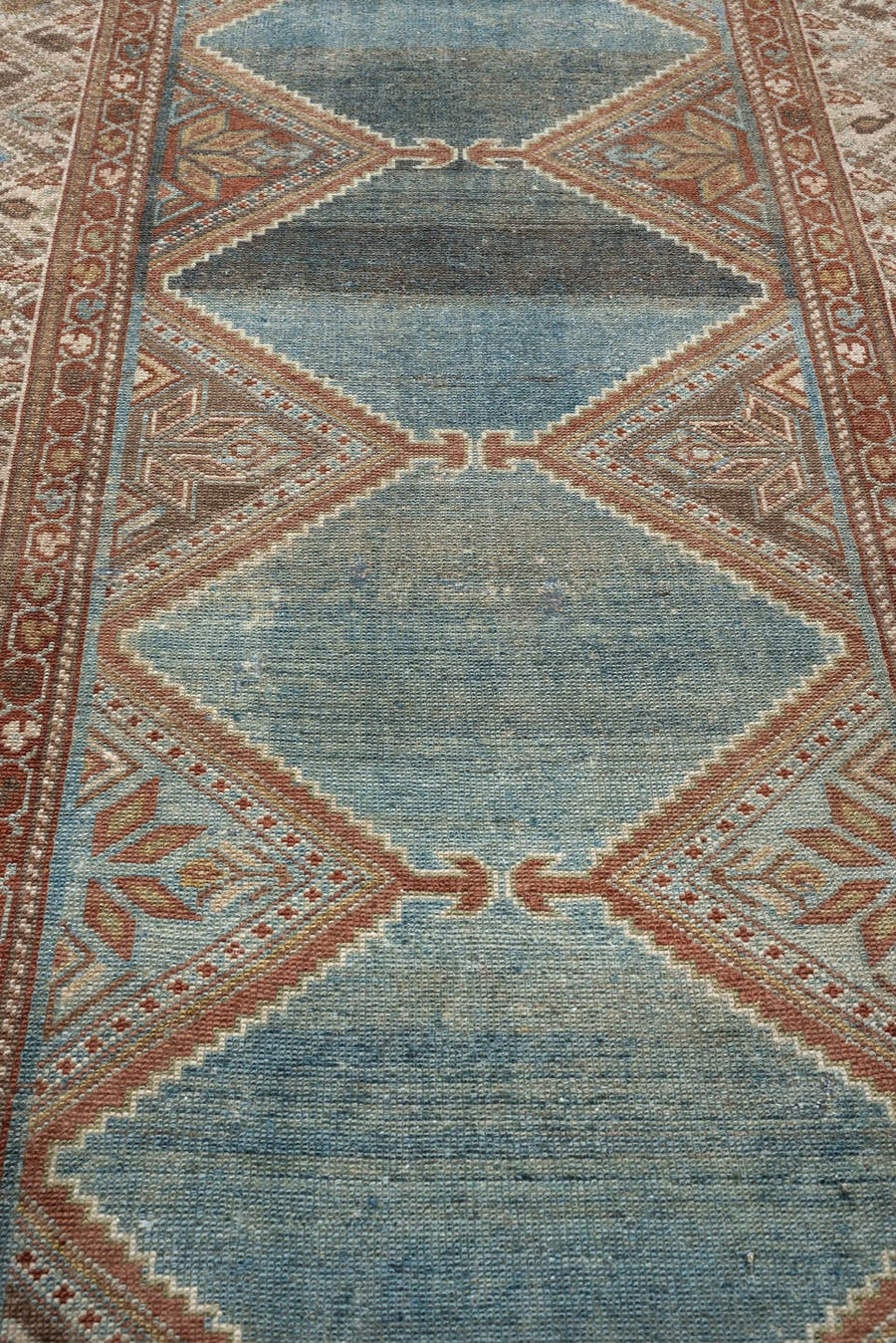 3' x 9' one-of-a-kind handmade antique Kurd runner rug. Color palette: teal, ivory, rust, slate, terracotta, taupe, charcoal