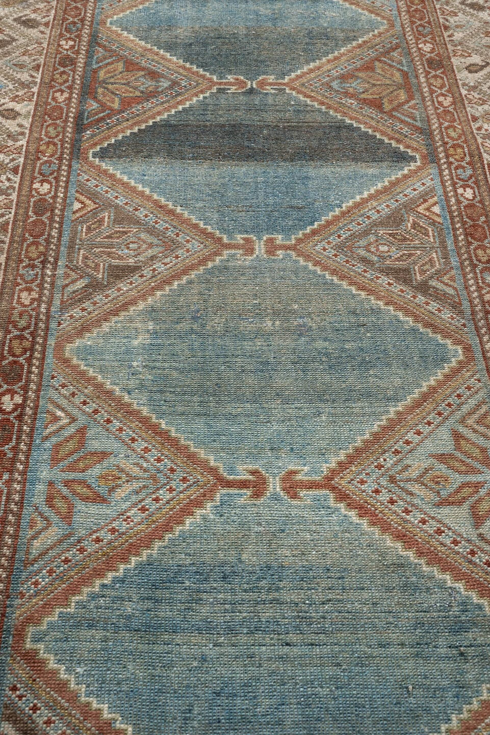 3' x 9' one-of-a-kind handmade antique Kurd runner rug. Color palette: teal, ivory, rust, slate, terracotta, taupe, charcoal