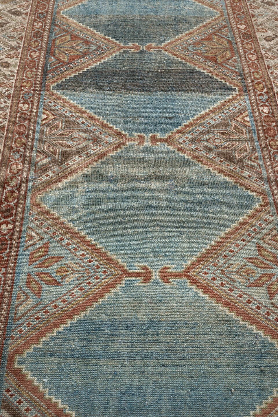 3' x 9' one-of-a-kind handmade antique Kurd runner rug. Color palette: teal, ivory, rust, slate, terracotta, taupe, charcoal