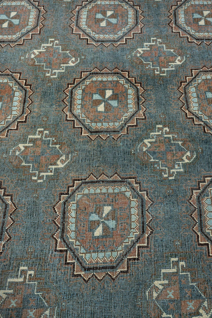 13' x 15' one-of-a-kind handmade antique Afghan oversize rug. Color palette: teal, rust, ivory, charcoal, taupe, camel, sage