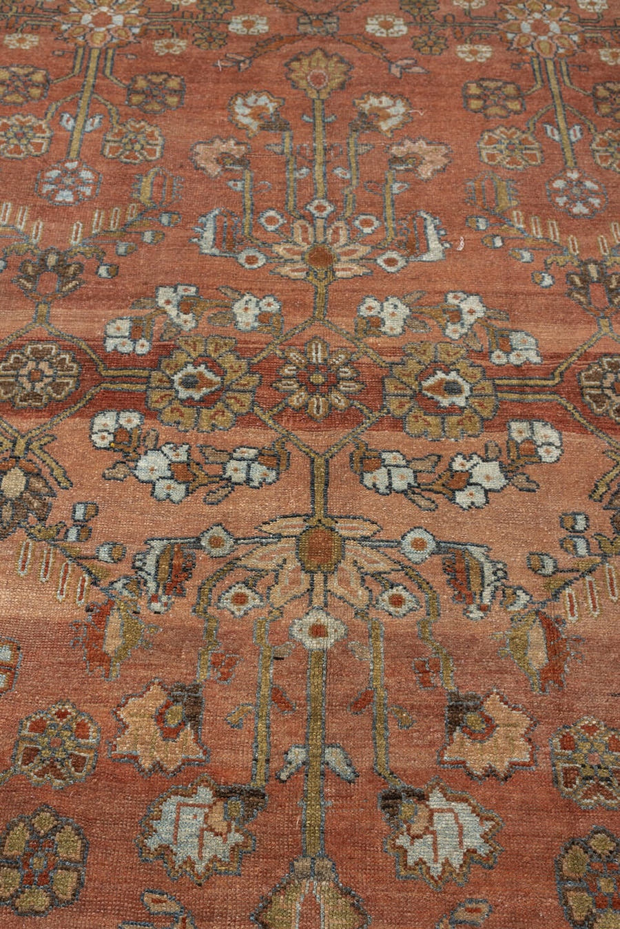 8' x 11' one-of-a-kind handmade antique Baktiary large size rug. Color palette: terra cotta, ivory, sky blue, camel