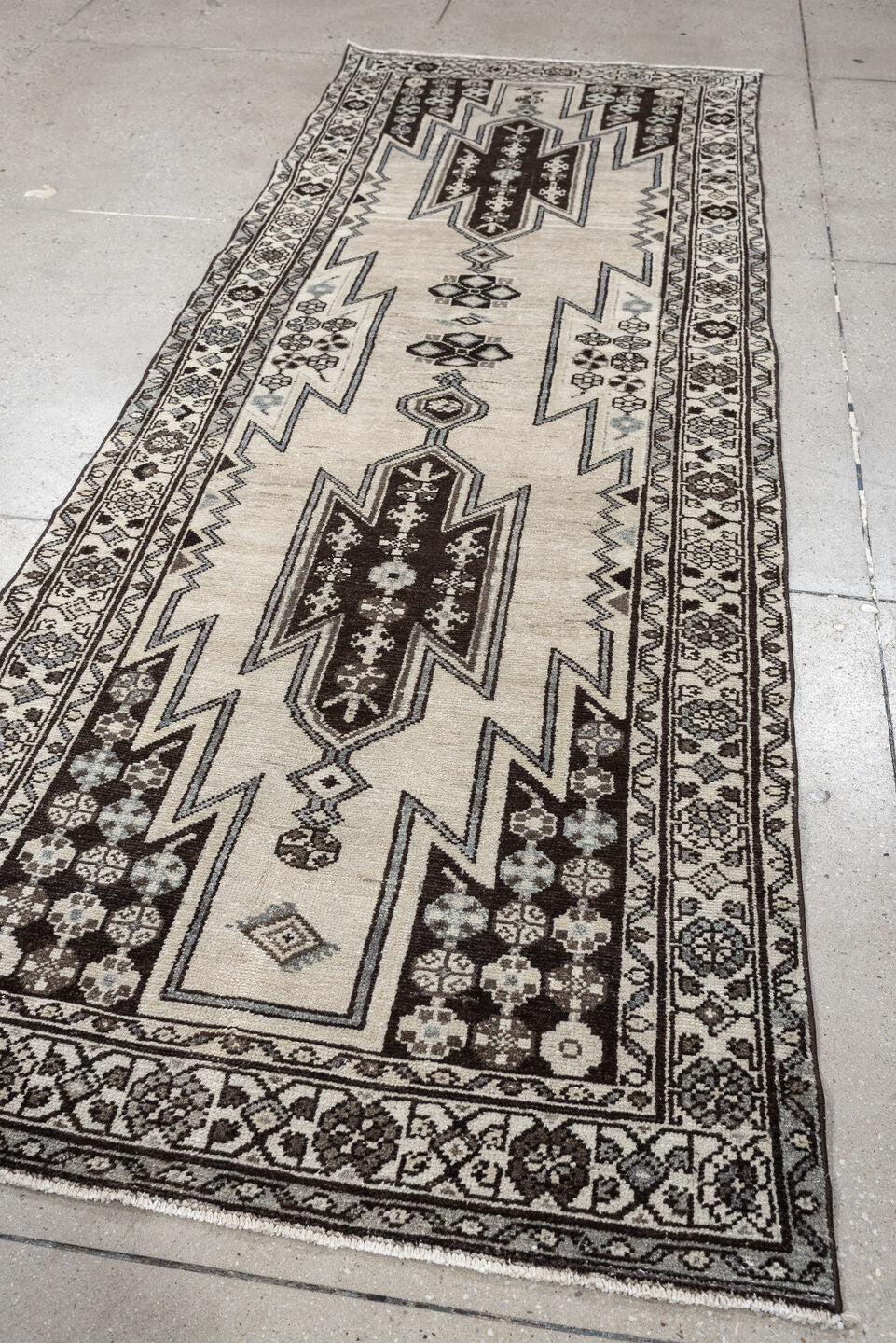 3' x 9' one-of-a-kind handmade antique Mazlagan runner rug. Color palette: ivory, dark brown, charcoal, taupe, soft gray
