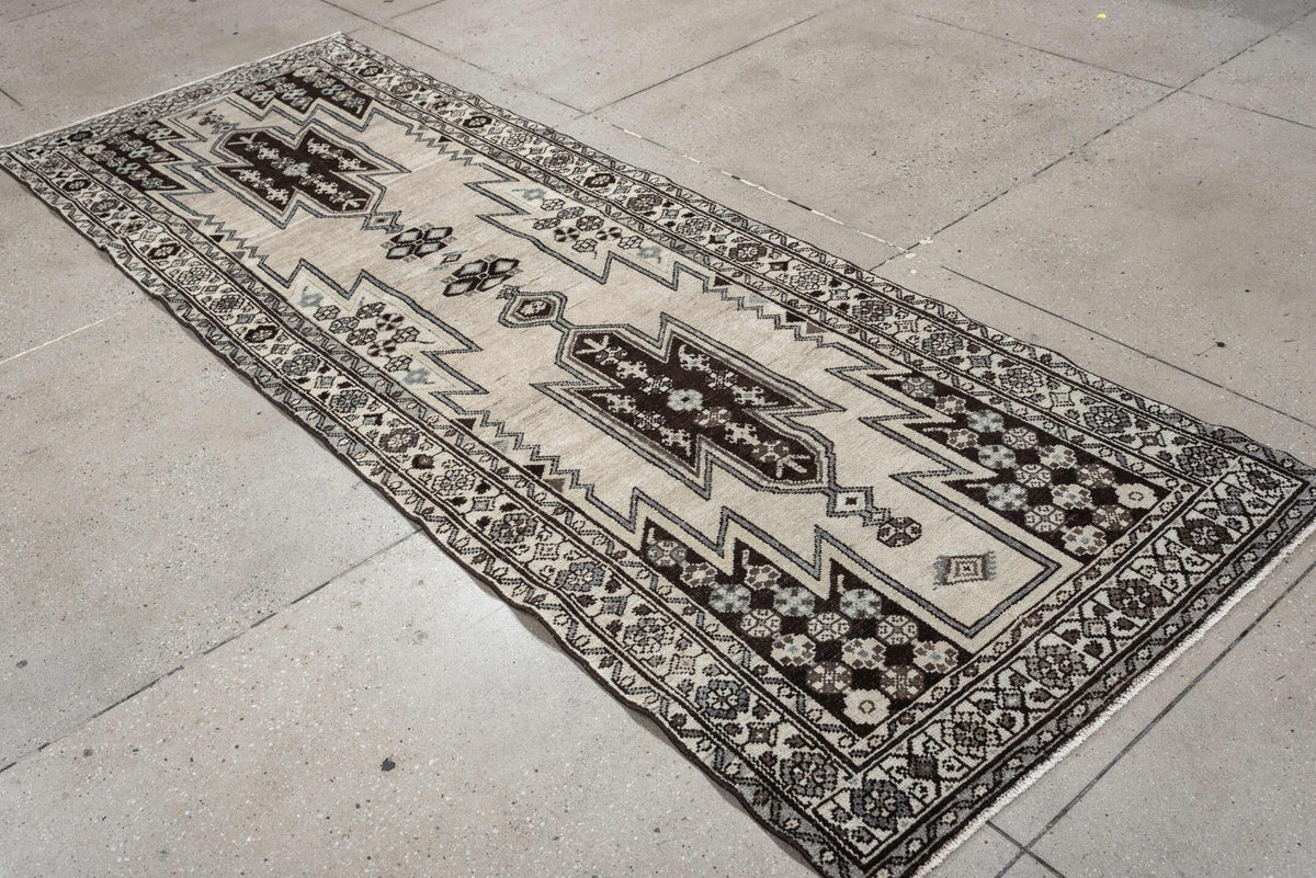 3' x 9' one-of-a-kind handmade antique Mazlagan runner rug. Color palette: ivory, dark brown, charcoal, taupe, soft gray