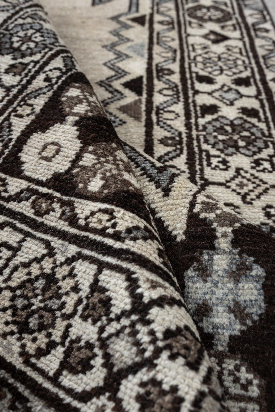3' x 9' one-of-a-kind handmade antique Mazlagan runner rug. Color palette: ivory, dark brown, charcoal, taupe, soft gray