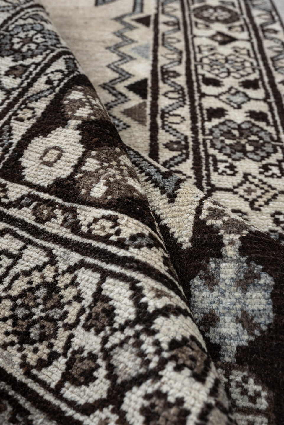 3' x 9' one-of-a-kind handmade antique Mazlagan runner rug. Color palette: ivory, dark brown, charcoal, taupe, soft gray