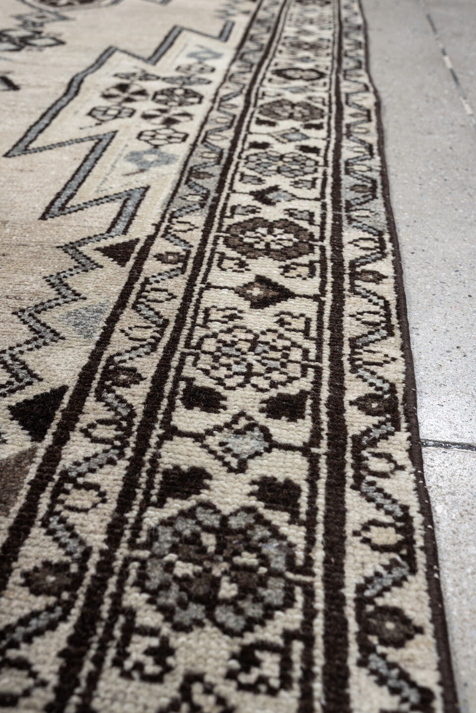 3' x 9' one-of-a-kind handmade antique Mazlagan runner rug. Color palette: ivory, dark brown, charcoal, taupe, soft gray