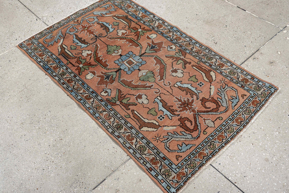 2' x 4' one-of-a-kind handmade antique Lilian small size rug. Color palette: salmon, slate blue, ivory, sage, rust, charcoal