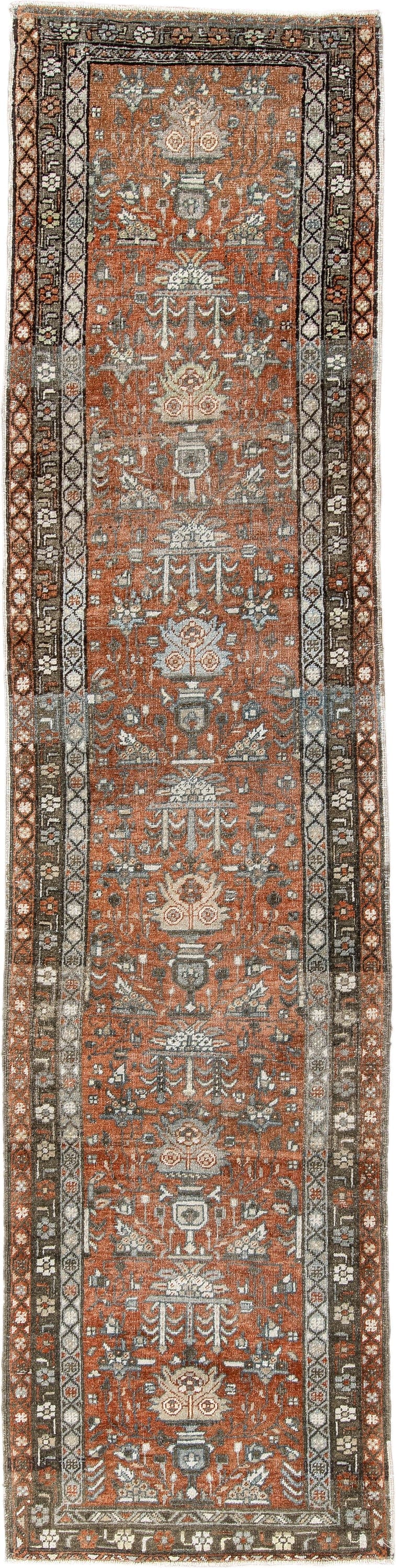 2' x 10' one-of-a-kind handmade antique Heriz runner rug. Color palette: rust, terra cotta, charcoal, ivory, slate blue