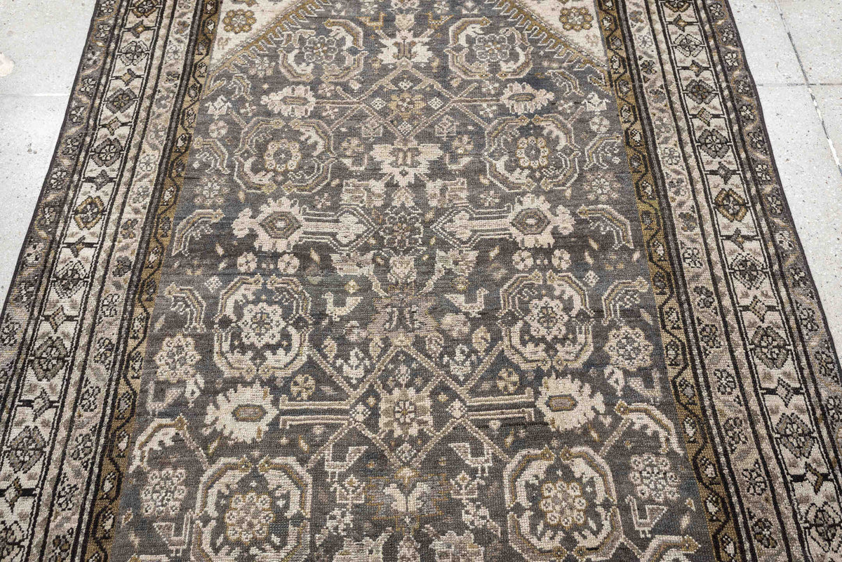 4' x 7' one-of-a-kind handmade antique Malayer rug. Color palette: charcoal, ivory, taupe, ochre, camel, ebony, slate, black
