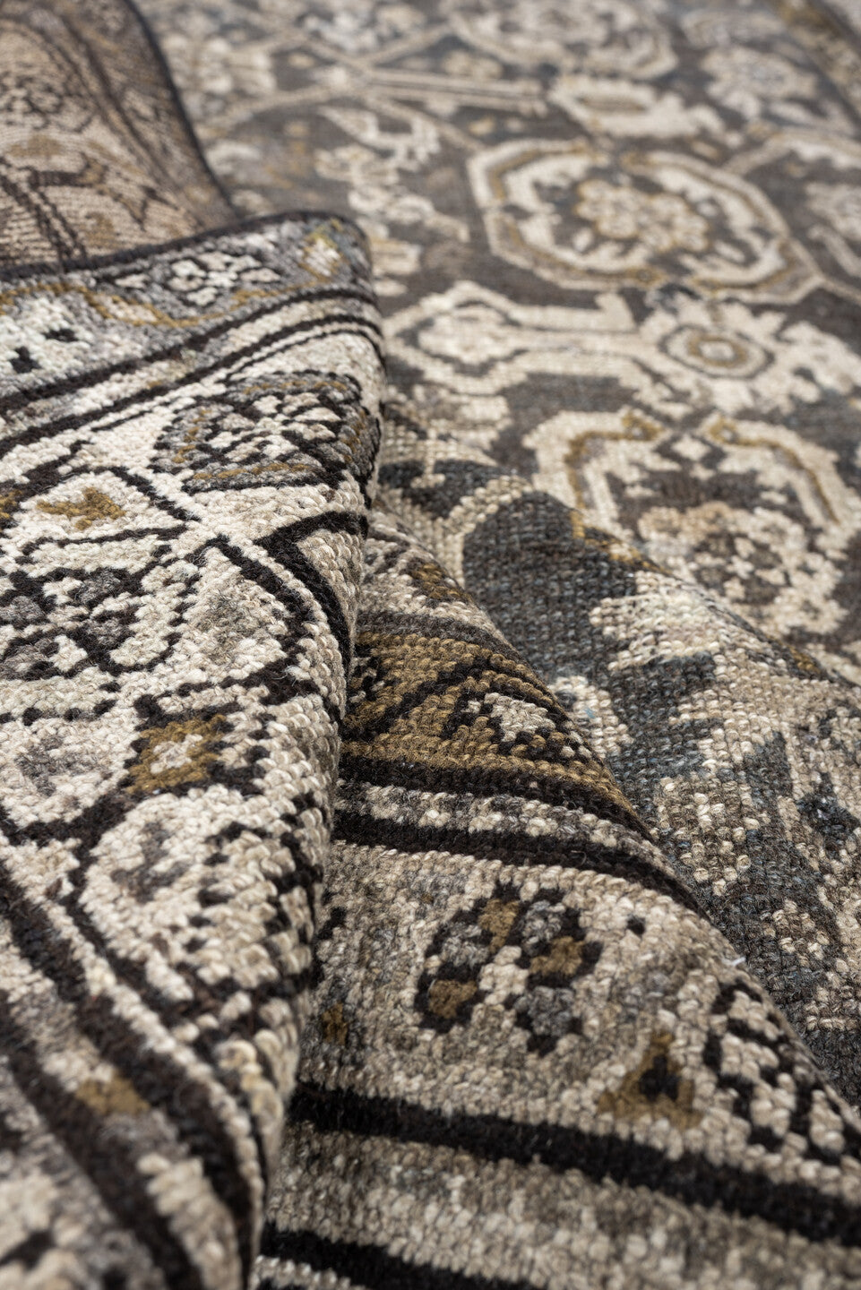 4' x 7' one-of-a-kind handmade antique Malayer rug. Color palette: charcoal, ivory, taupe, ochre, camel, ebony, slate, black