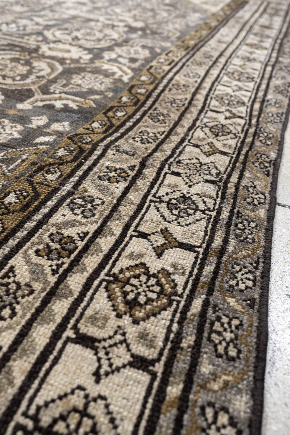 4' x 7' one-of-a-kind handmade antique Malayer rug. Color palette: charcoal, ivory, taupe, ochre, camel, ebony, slate, black