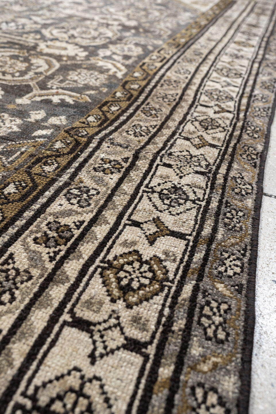 4' x 7' one-of-a-kind handmade antique Malayer rug. Color palette: charcoal, ivory, taupe, ochre, camel, ebony, slate, black
