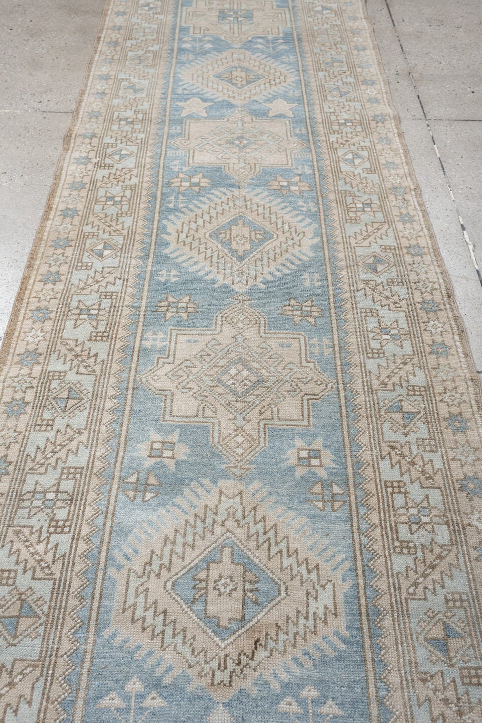3' x 11' one-of-a-kind handmade antique Heriz runner rug. Color palette: sky blue, ivory, taupe, beige, camel, slate, brown