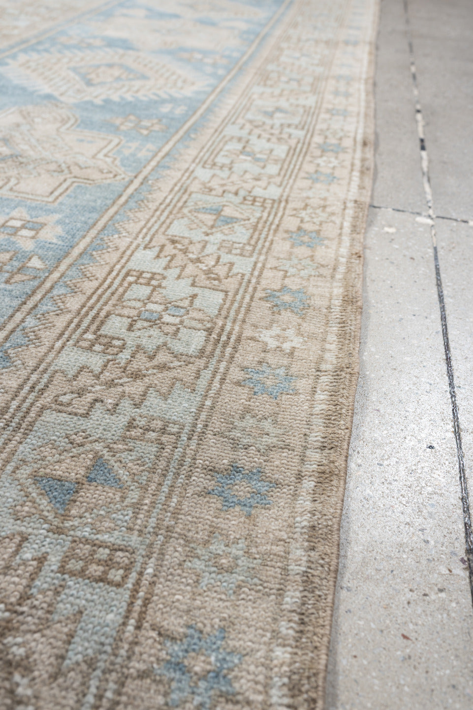 3' x 11' one-of-a-kind handmade antique Heriz runner rug. Color palette: sky blue, ivory, taupe, beige, camel, slate, brown