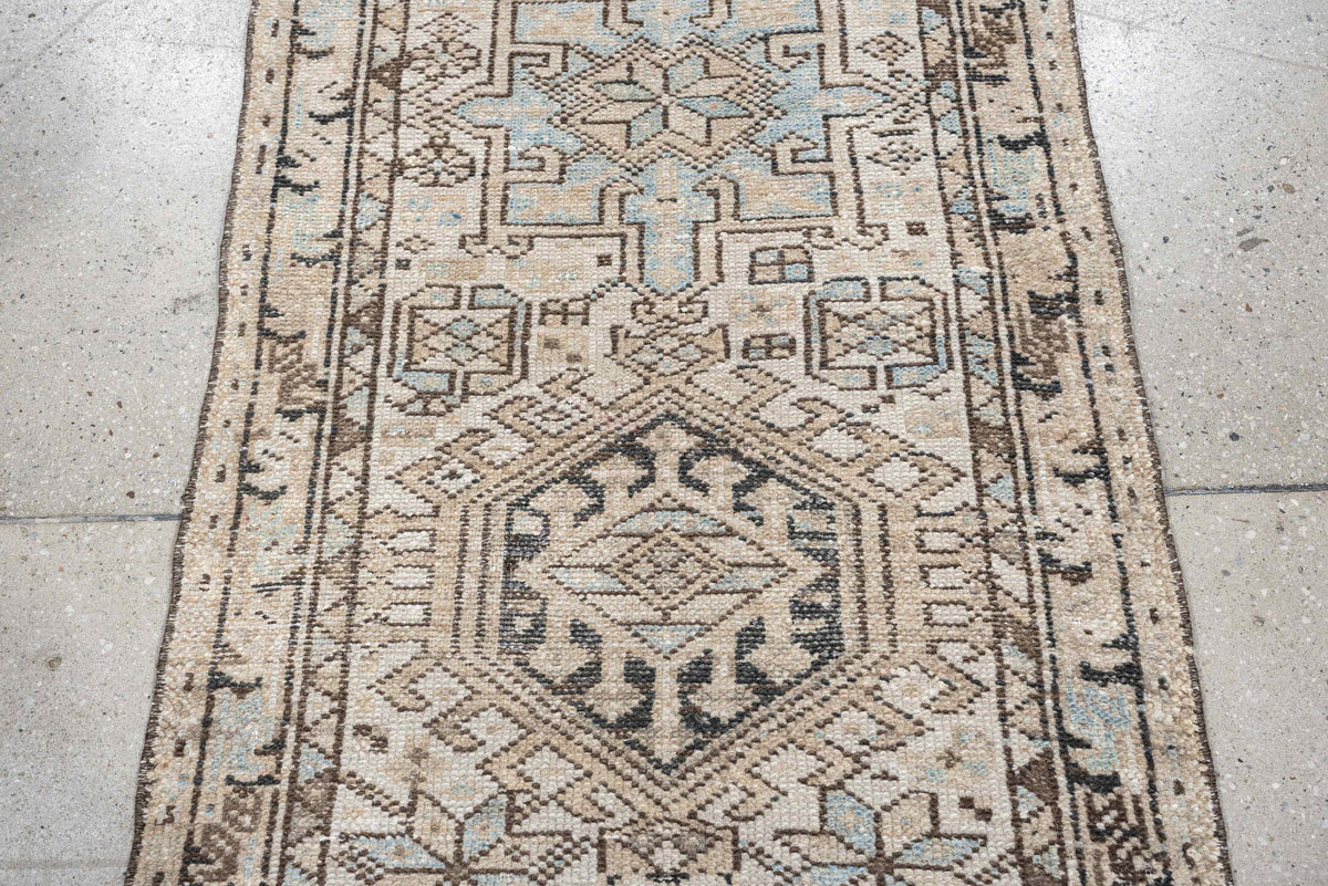2' x 7' one-of-a-kind handmade antique Karaje runner rug. Color palette: ivory, pale blue, taupe, brown, charcoal, beige