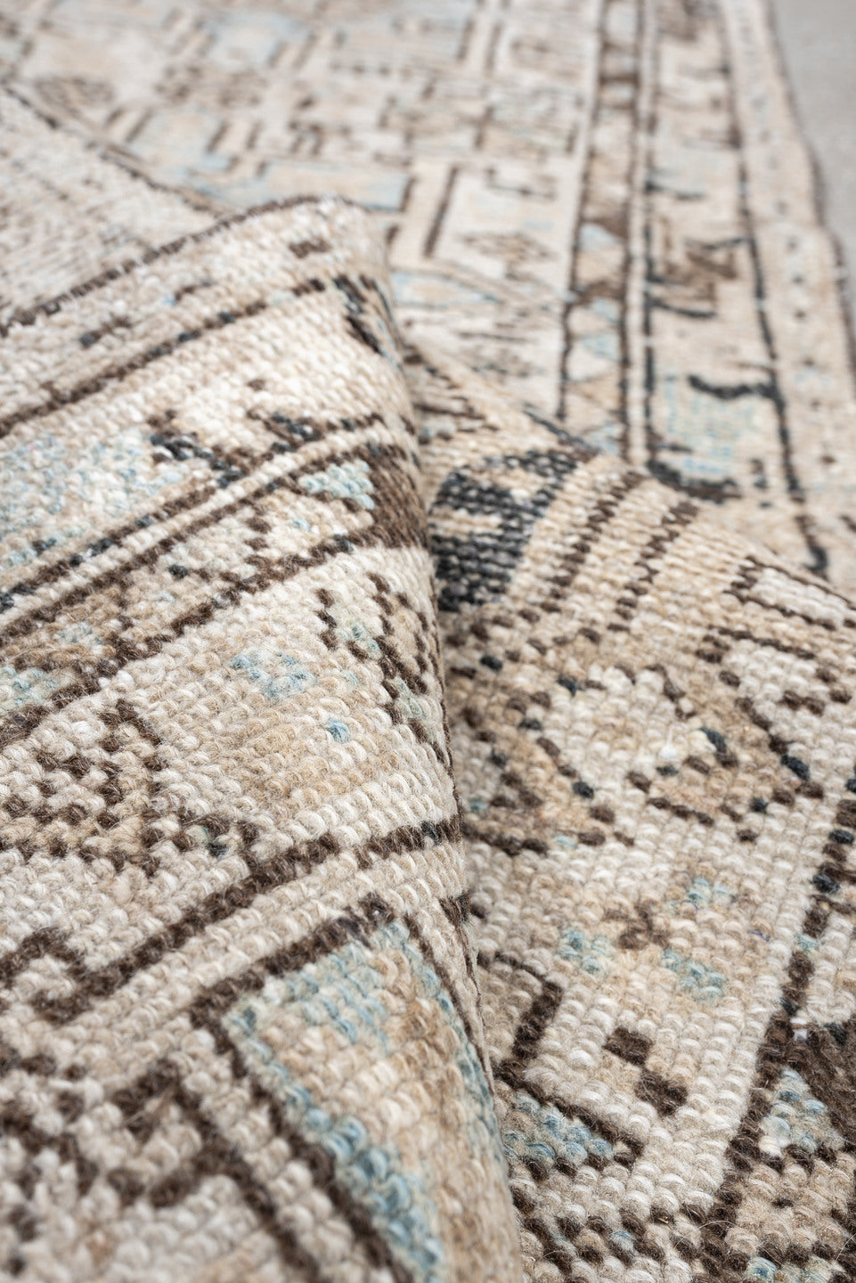 2' x 7' one-of-a-kind handmade antique Karaje runner rug. Color palette: ivory, pale blue, taupe, brown, charcoal, beige