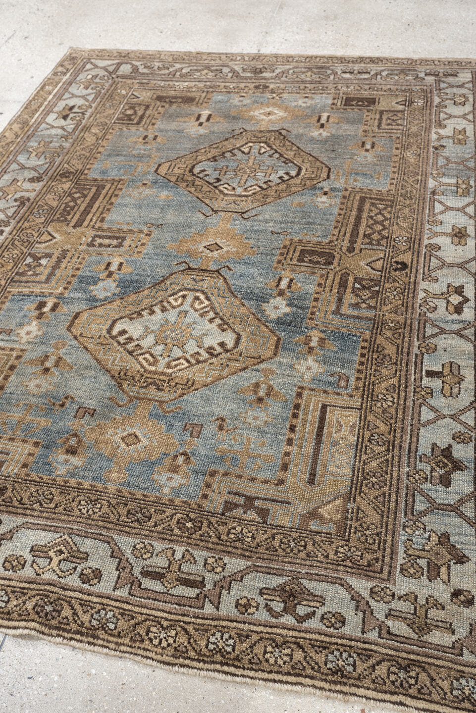 4' x 6' one-of-a-kind handmade antique Kurd rug. Color palette: blue gray, ivory, camel, taupe, dark brown, charcoal, beige