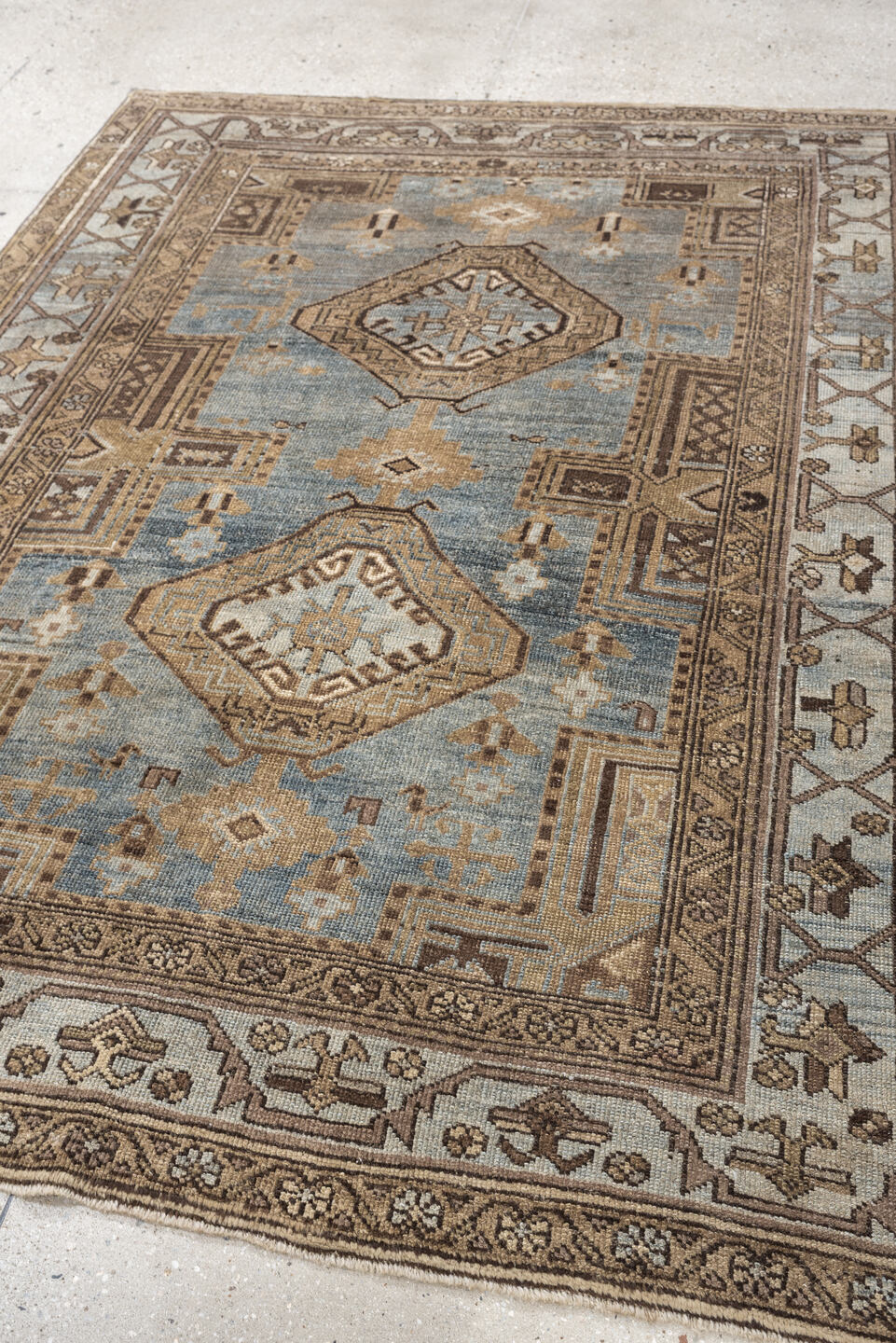 4' x 6' one-of-a-kind handmade antique Kurd rug. Color palette: blue gray, ivory, camel, taupe, dark brown, charcoal, beige