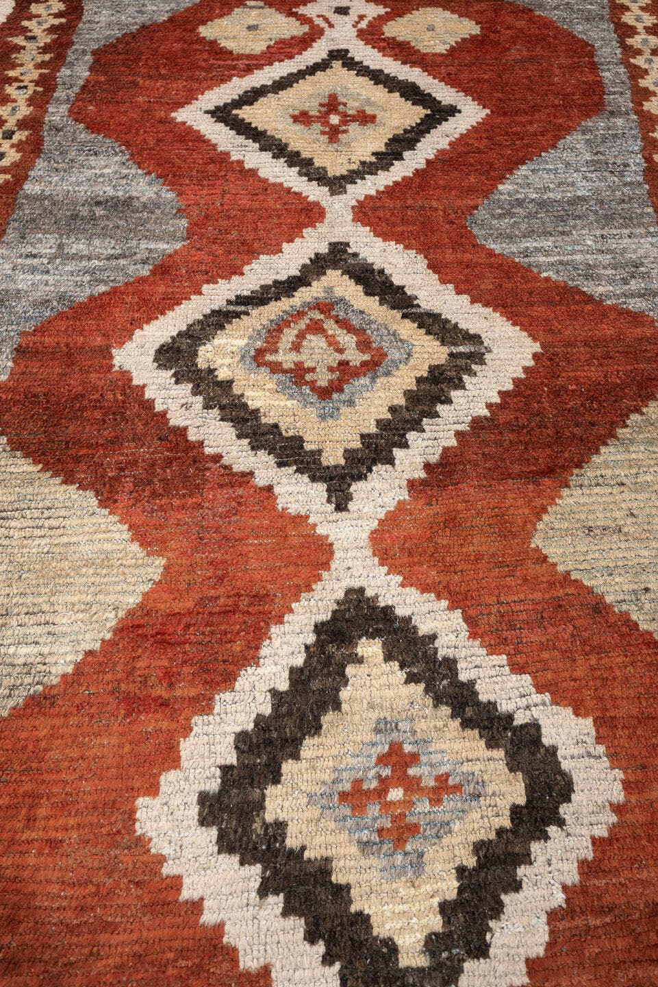 4' x 7' one-of-a-kind handmade antique Gabbe rug. Color palette: rust, ivory, gray, dark brown, cream, charcoal, terracotta