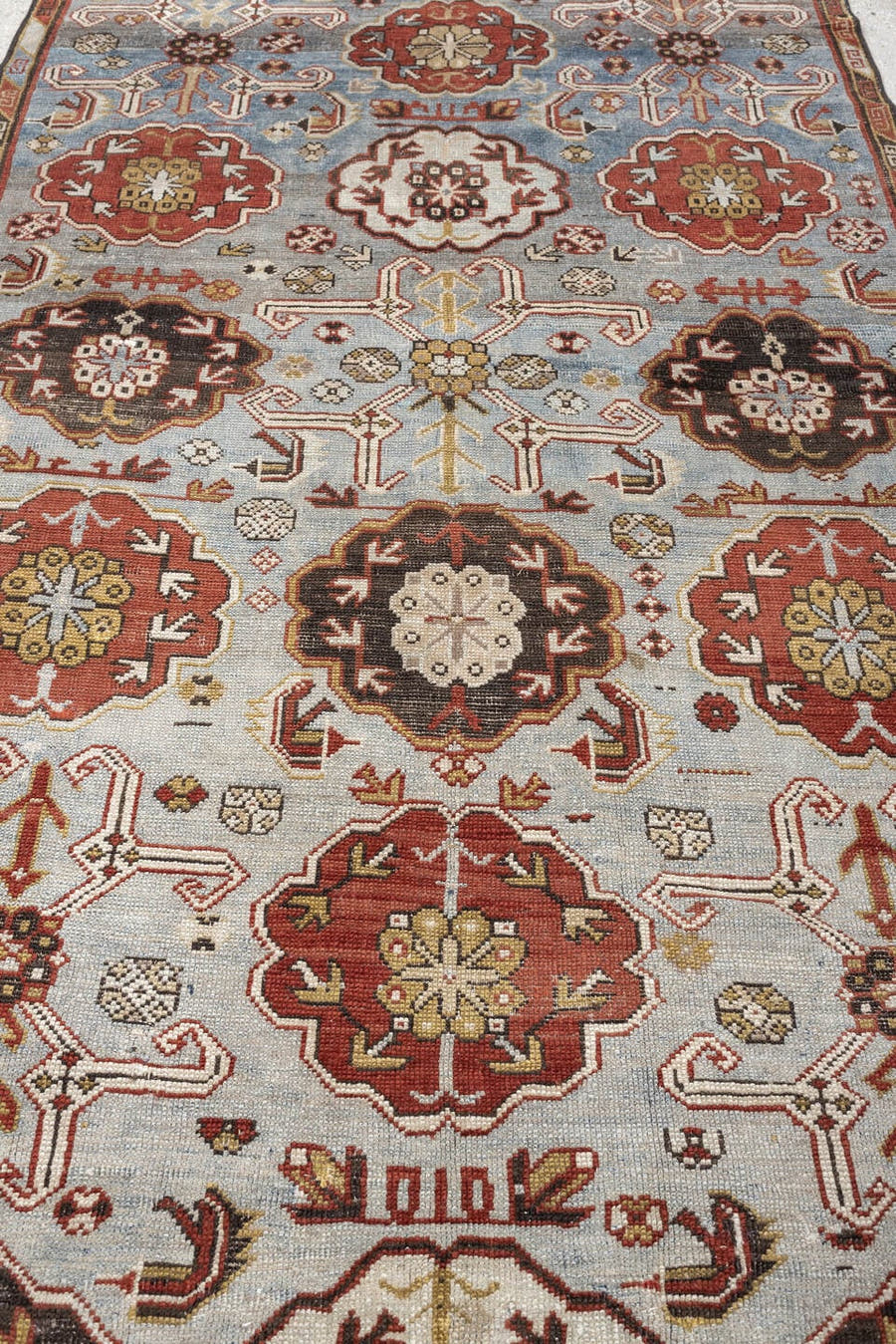 4' x 9' one-of-a-kind handmade antique Kuba runner rug. Color palette: blue gray, rust, ivory, charcoal, dark brown, tan