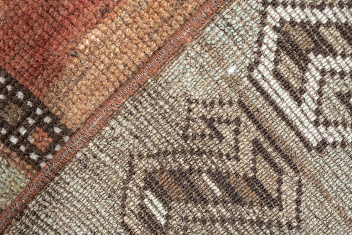 3' x 10' one-of-a-kind handmade antique Kurd runner rug. Color palette: rust, terra cotta, pale blue, taupe, ivory, sage