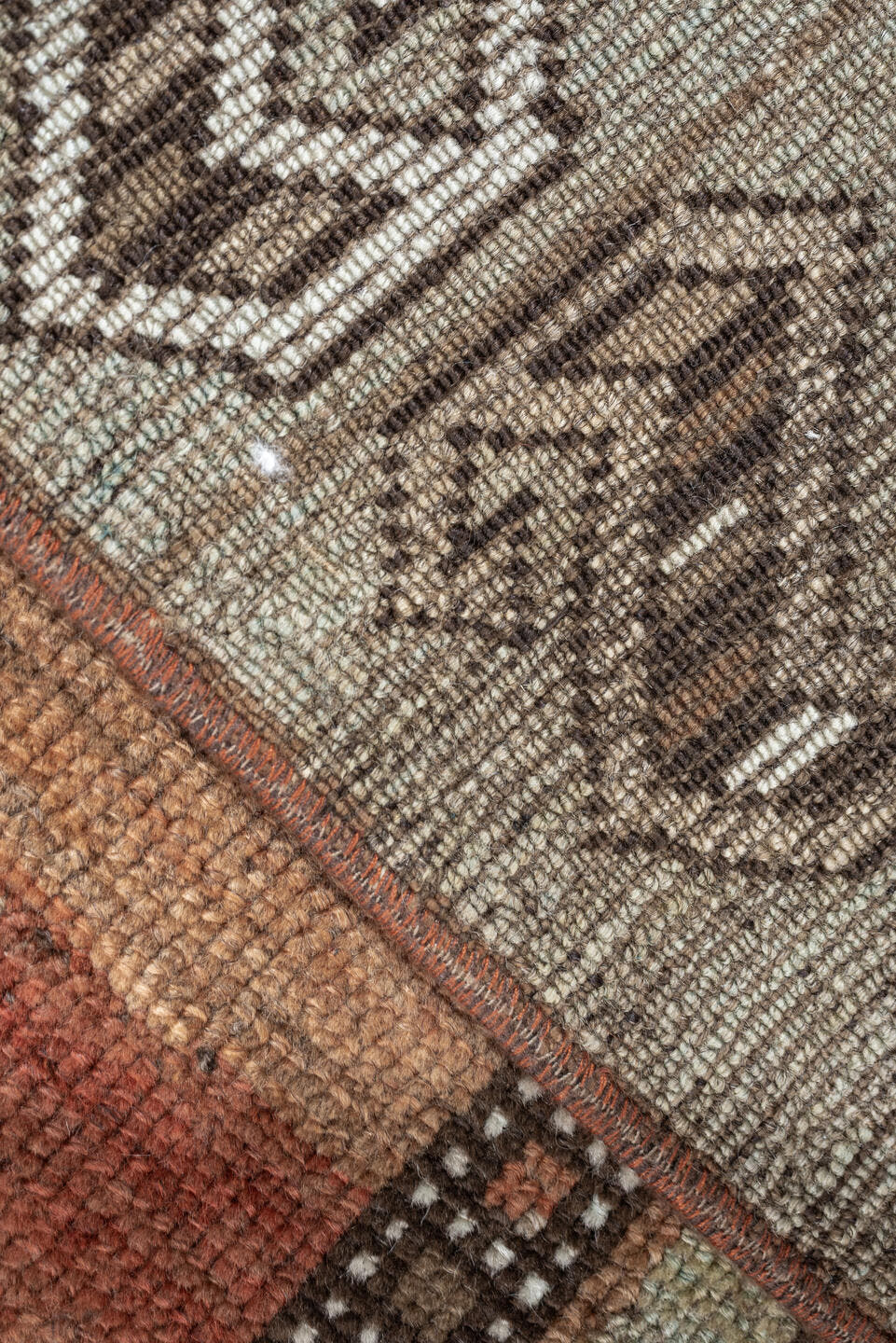3' x 10' one-of-a-kind handmade antique Kurd runner rug. Color palette: rust, terra cotta, pale blue, taupe, ivory, sage
