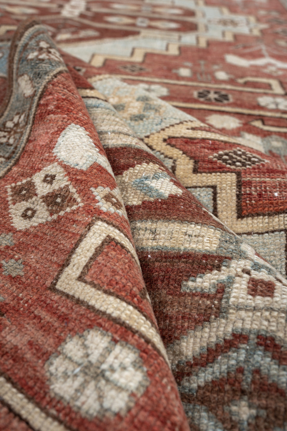 3' x 5' one-of-a-kind handmade vintage Anatolian small size rug. Color palette: terracotta, pale blue gray, ivory, slate