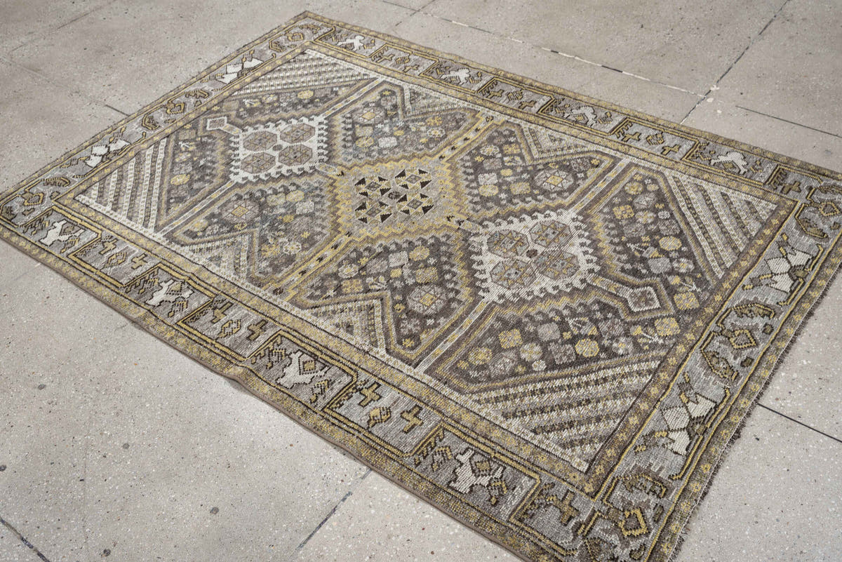 4' x 5' one-of-a-kind handmade antique Shiraz small size rug. Color palette: taupe, charcoal, ivory, soft gold, gray, brown