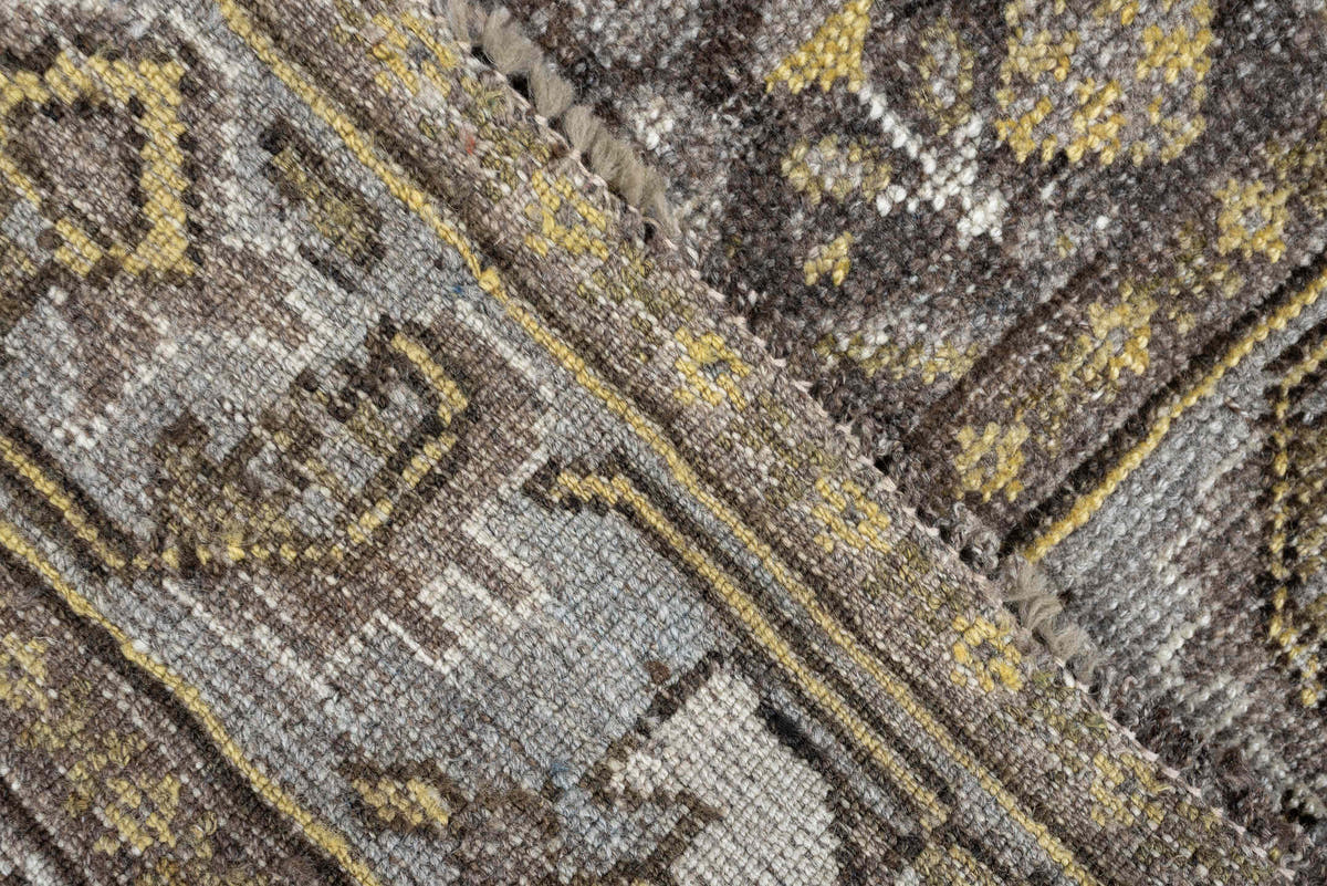 4' x 5' one-of-a-kind handmade antique Shiraz small size rug. Color palette: taupe, charcoal, ivory, soft gold, gray, brown