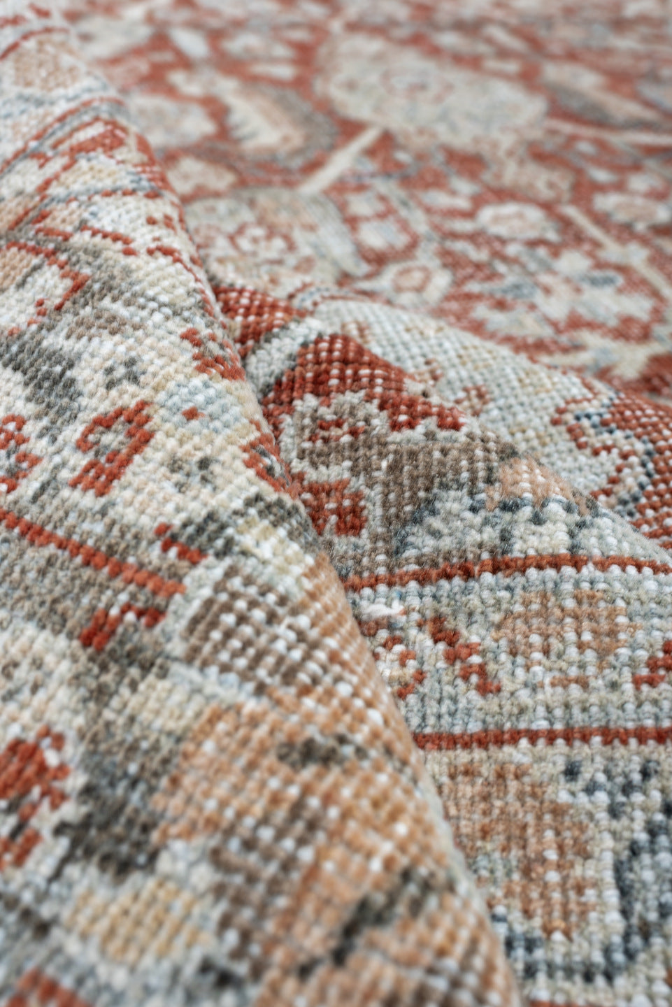 10' x 13' one-of-a-kind handmade vintage Mahal large size rug. Color palette: terracotta, pale blue, ivory, rust, taupe