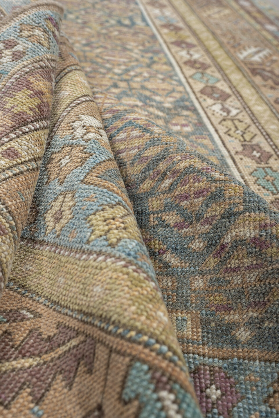 3' x 8' one-of-a-kind handmade antique Kurd runner rug. Color palette: blue gray, ivory, taupe, dusty rose, muted teal, sage