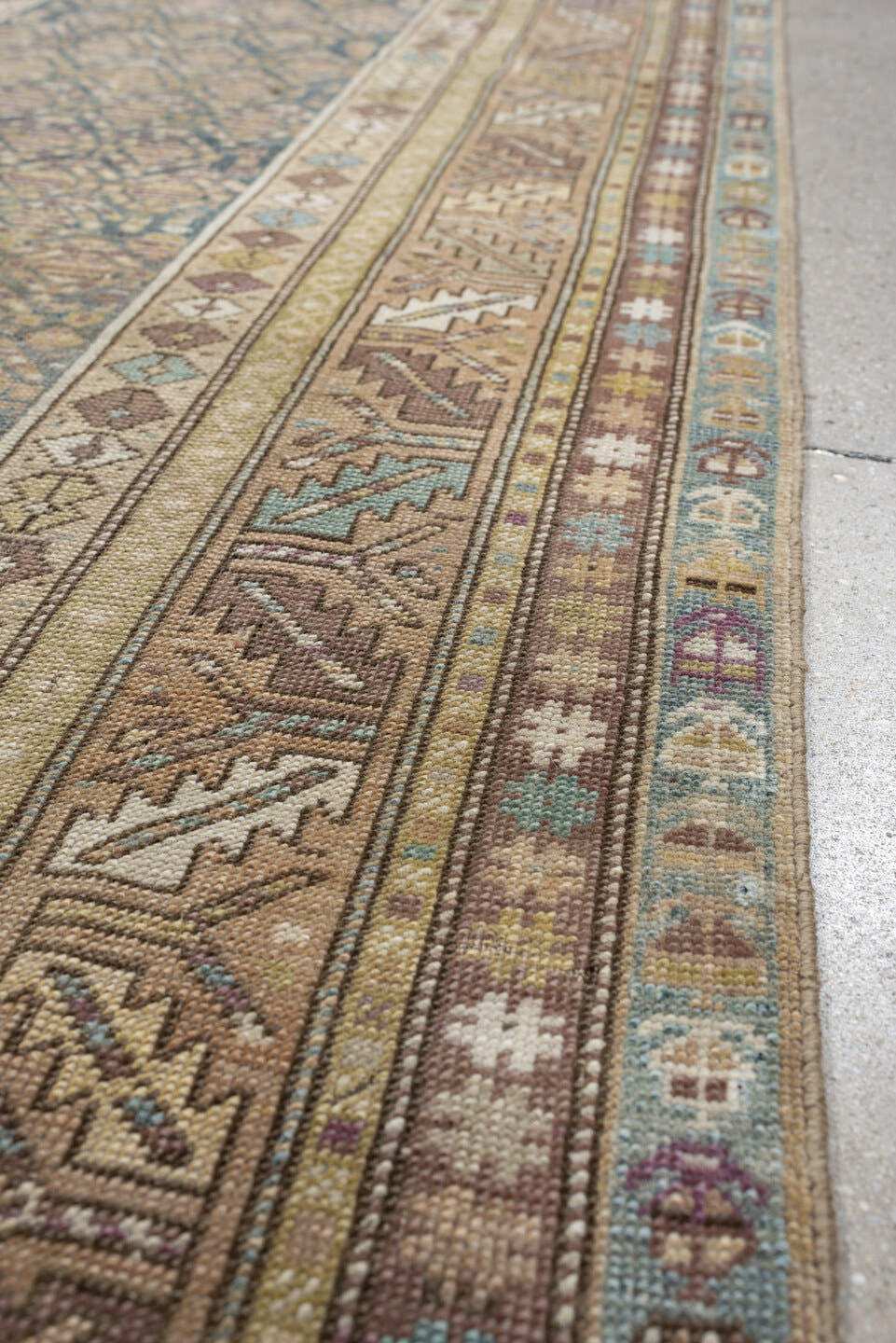 3' x 8' one-of-a-kind handmade antique Kurd runner rug. Color palette: blue gray, ivory, taupe, dusty rose, muted teal, sage
