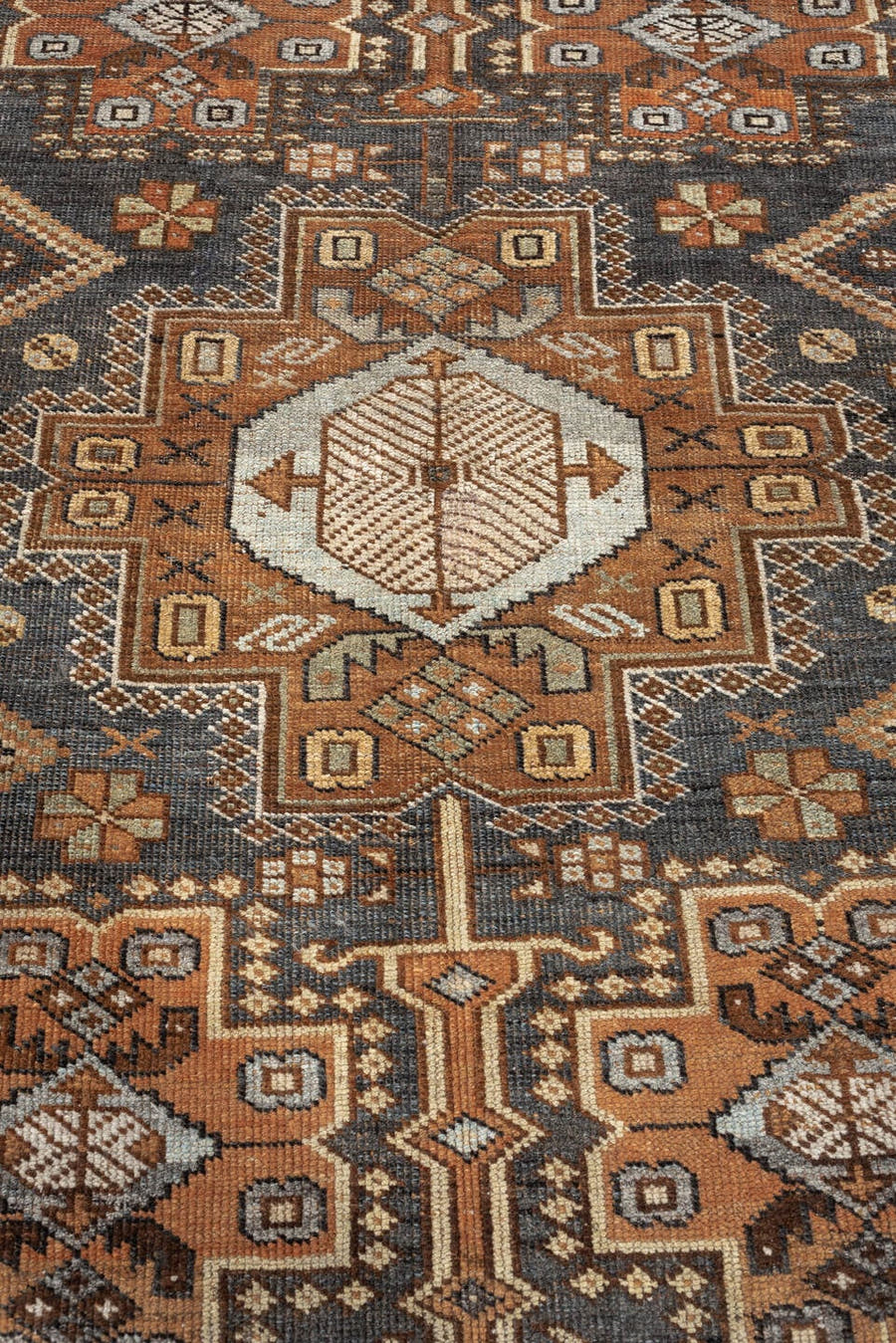 3' x 4' one-of-a-kind handmade antique Shiraz small size rug. Color palette: charcoal, rust, ivory, camel, taupe, slate