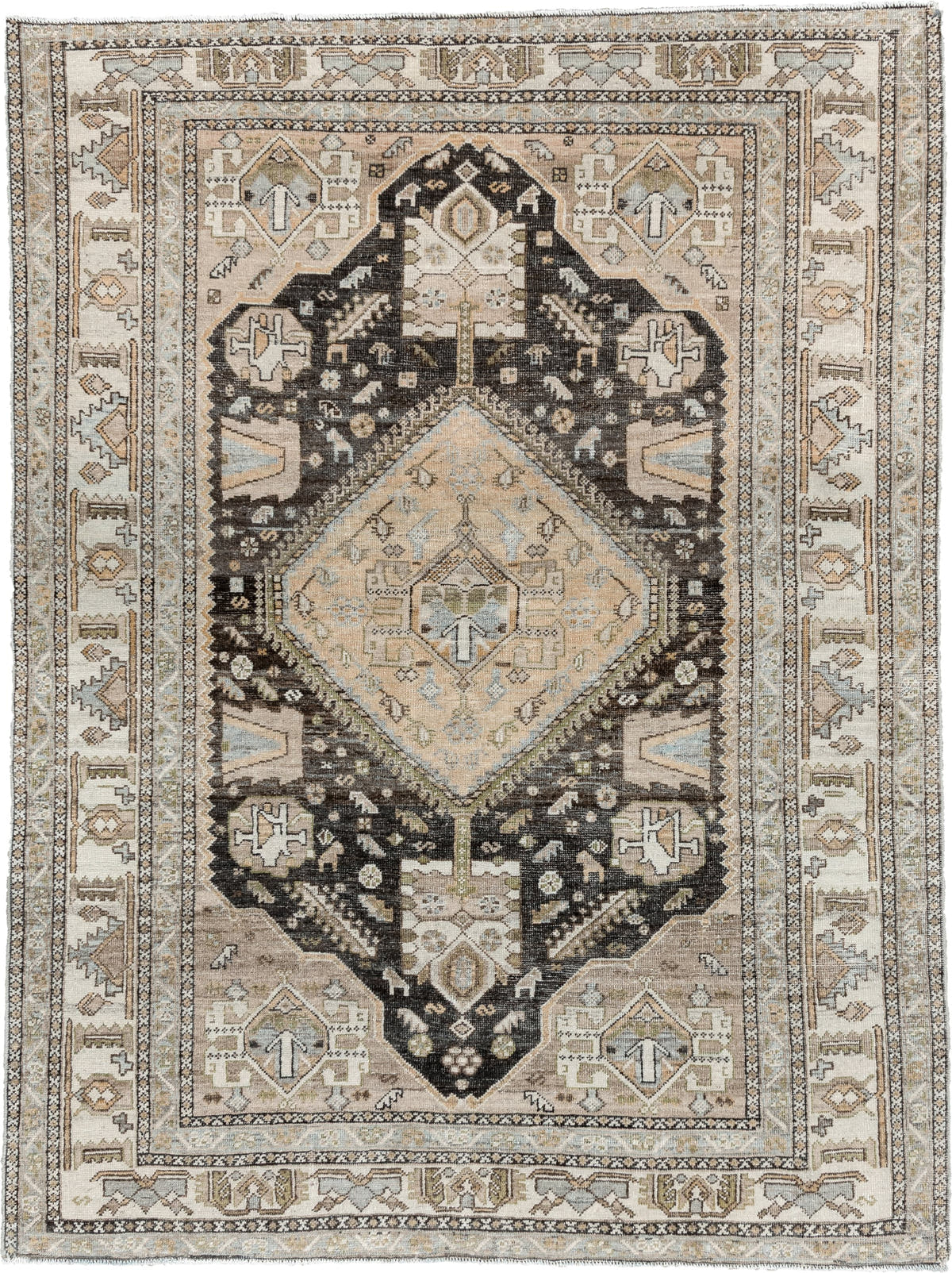 4' x 6' one-of-a-kind handmade antique Shiraz rug. Color palette: ivory, charcoal, camel, taupe, pale blue, olive, sand