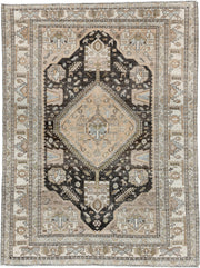 4' x 6' one-of-a-kind handmade antique Shiraz rug. Color palette: ivory, charcoal, camel, taupe, pale blue, olive, sand