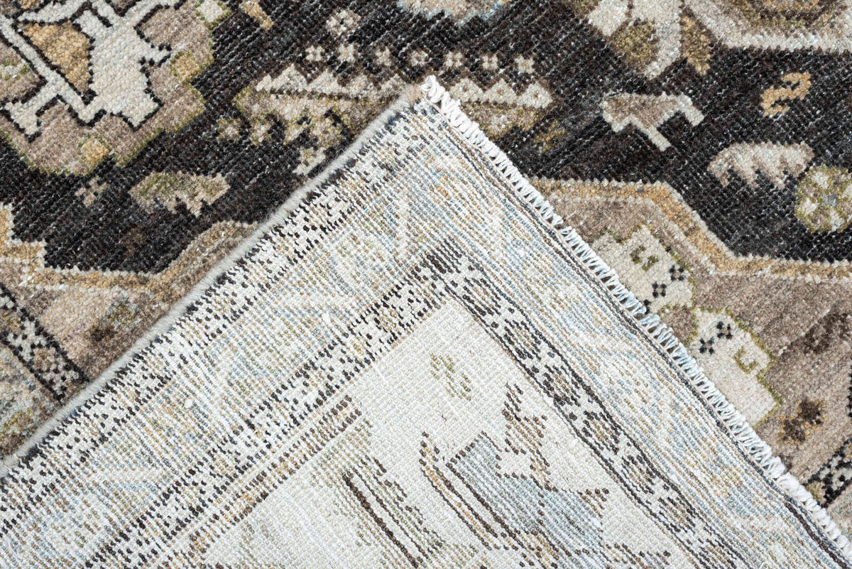 4' x 6' one-of-a-kind handmade antique Shiraz rug. Color palette: ivory, charcoal, camel, taupe, pale blue, olive, sand