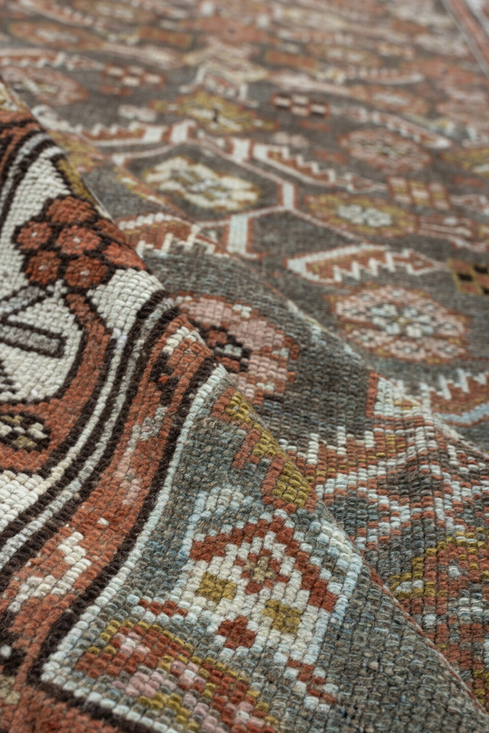 3' x 13' one-of-a-kind handmade antique Malayer runner rug. Color palette: charcoal, rust, ivory, sage, ochre, taupe